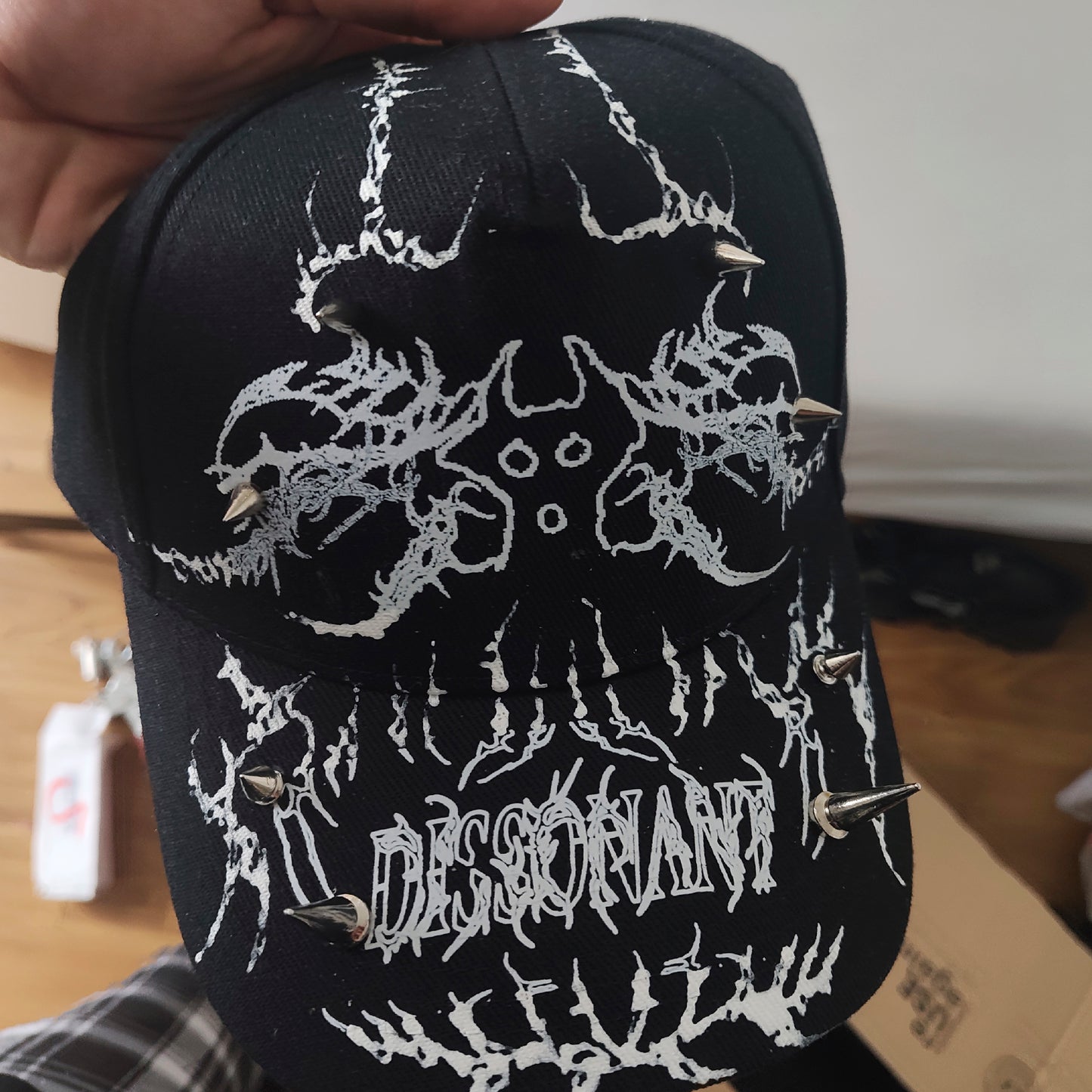 CAP_DISSONANT_BLACK