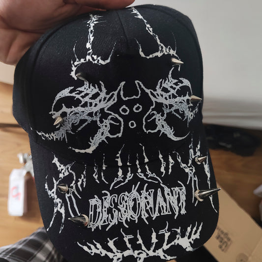 CAP_DISSONANT_BLACK