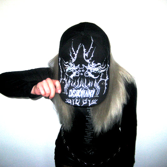 CAP_DISSONANT_BLACK
