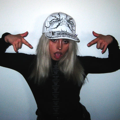 CAP_DISSONANT_WHITE